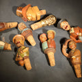 Lot 070 - Grouping of Nine Vintage Carved and Painted Wood Figural Bottle Stoppers Including Animated Examples