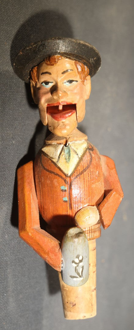 Grouping of Nine Vintage Carved and Painted Wood Figural Bottle Stoppers Including Animated Examples