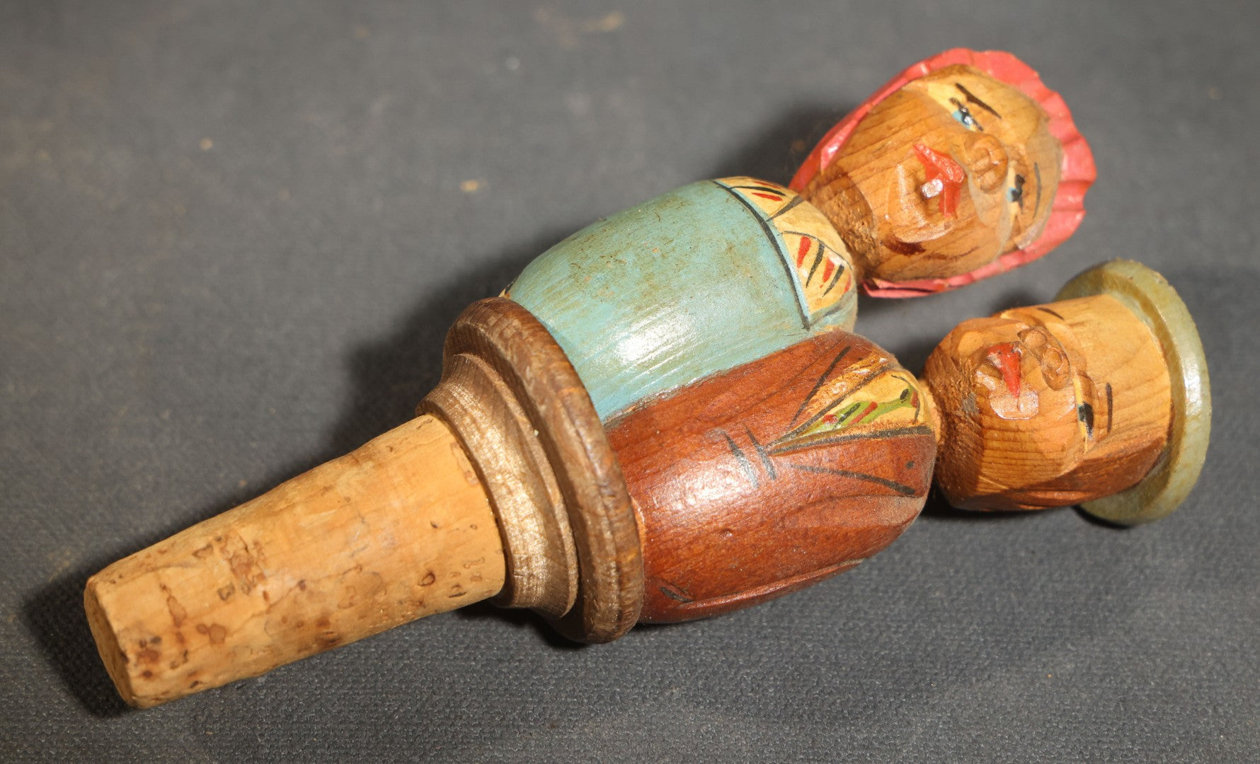 Grouping of Nine Vintage Carved and Painted Wood Figural Bottle Stoppers Including Animated Examples
