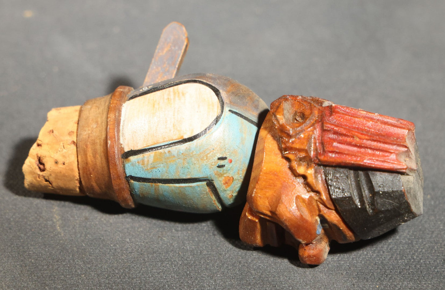 Grouping of Nine Vintage Carved and Painted Wood Figural Bottle Stoppers Including Animated Examples