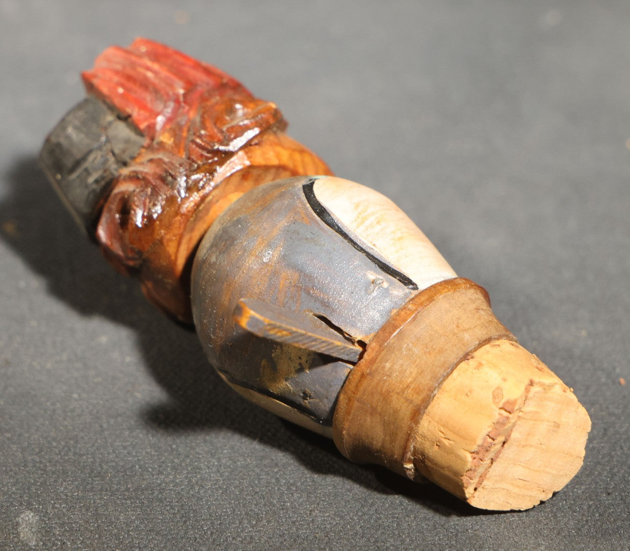 Grouping of Nine Vintage Carved and Painted Wood Figural Bottle Stoppers Including Animated Examples