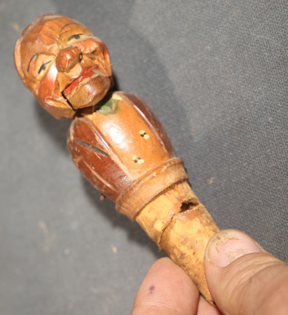 Grouping of Nine Vintage Carved and Painted Wood Figural Bottle Stoppers Including Animated Examples