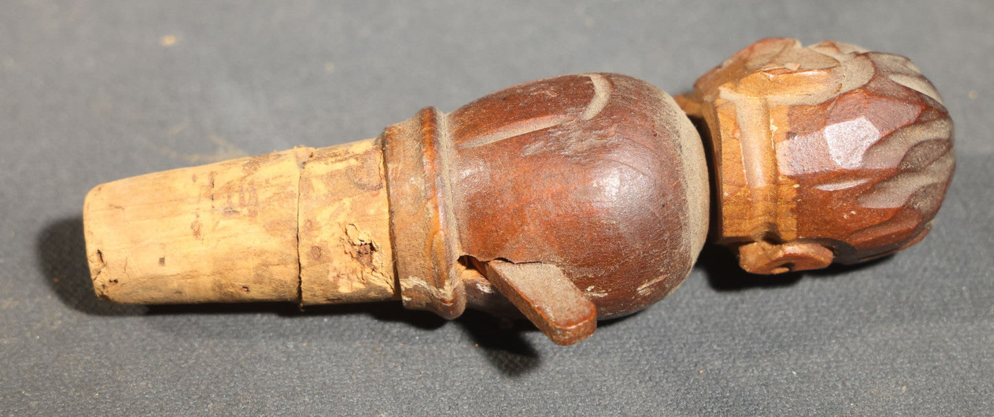 Grouping of Nine Vintage Carved and Painted Wood Figural Bottle Stoppers Including Animated Examples