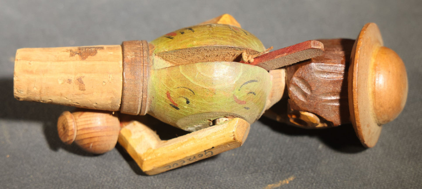 Grouping of Nine Vintage Carved and Painted Wood Figural Bottle Stoppers Including Animated Examples