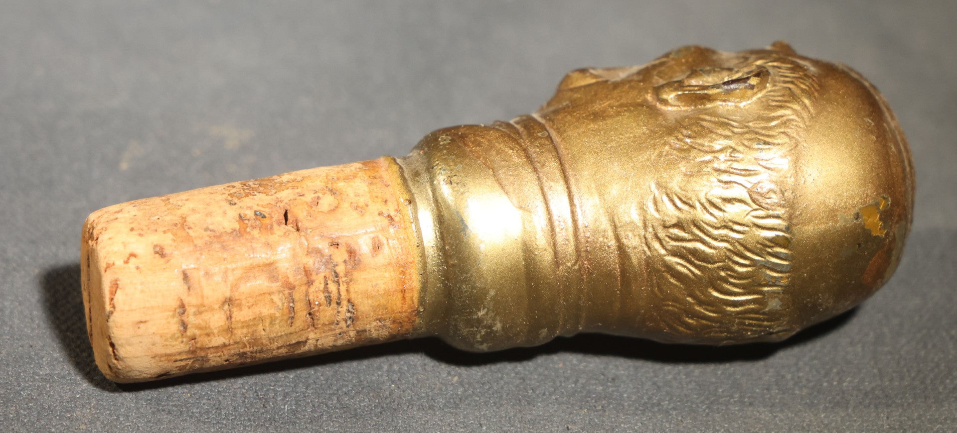 Grouping of Nine Vintage Carved and Painted Wood Figural Bottle Stoppers Including Animated Examples