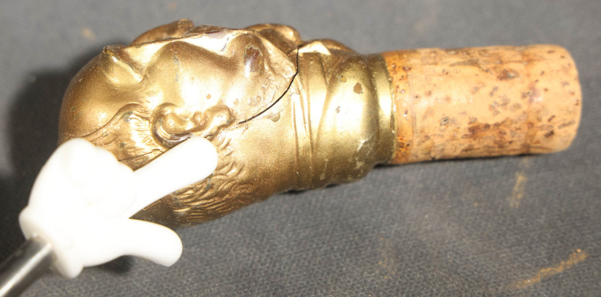 Grouping of Nine Vintage Carved and Painted Wood Figural Bottle Stoppers Including Animated Examples