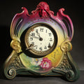 Lot 003 - Antique Art Nouveau Porcelain Mantel Clock with Figural Head and Floral Decoration, Ansonia Clock Company, Bonn Germany, note severe damage to dial, 12-1/4" H
