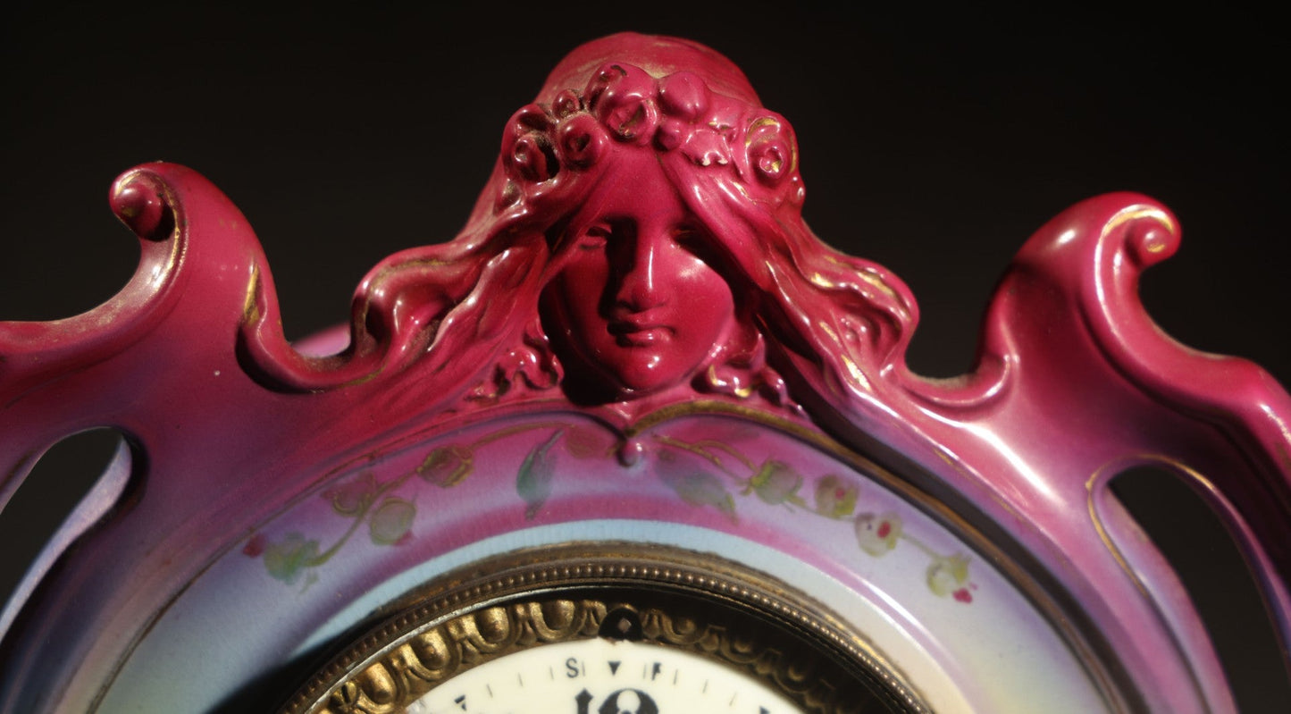 Antique Art Nouveau Porcelain Mantel Clock with Figural Head and Floral Decoration, Ansonia Clock Company, Bonn Germany, note severe damage to dial