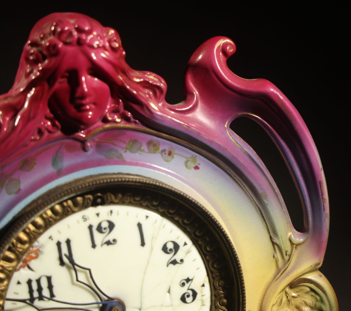 Antique Art Nouveau Porcelain Mantel Clock with Figural Head and Floral Decoration, Ansonia Clock Company, Bonn Germany, note severe damage to dial