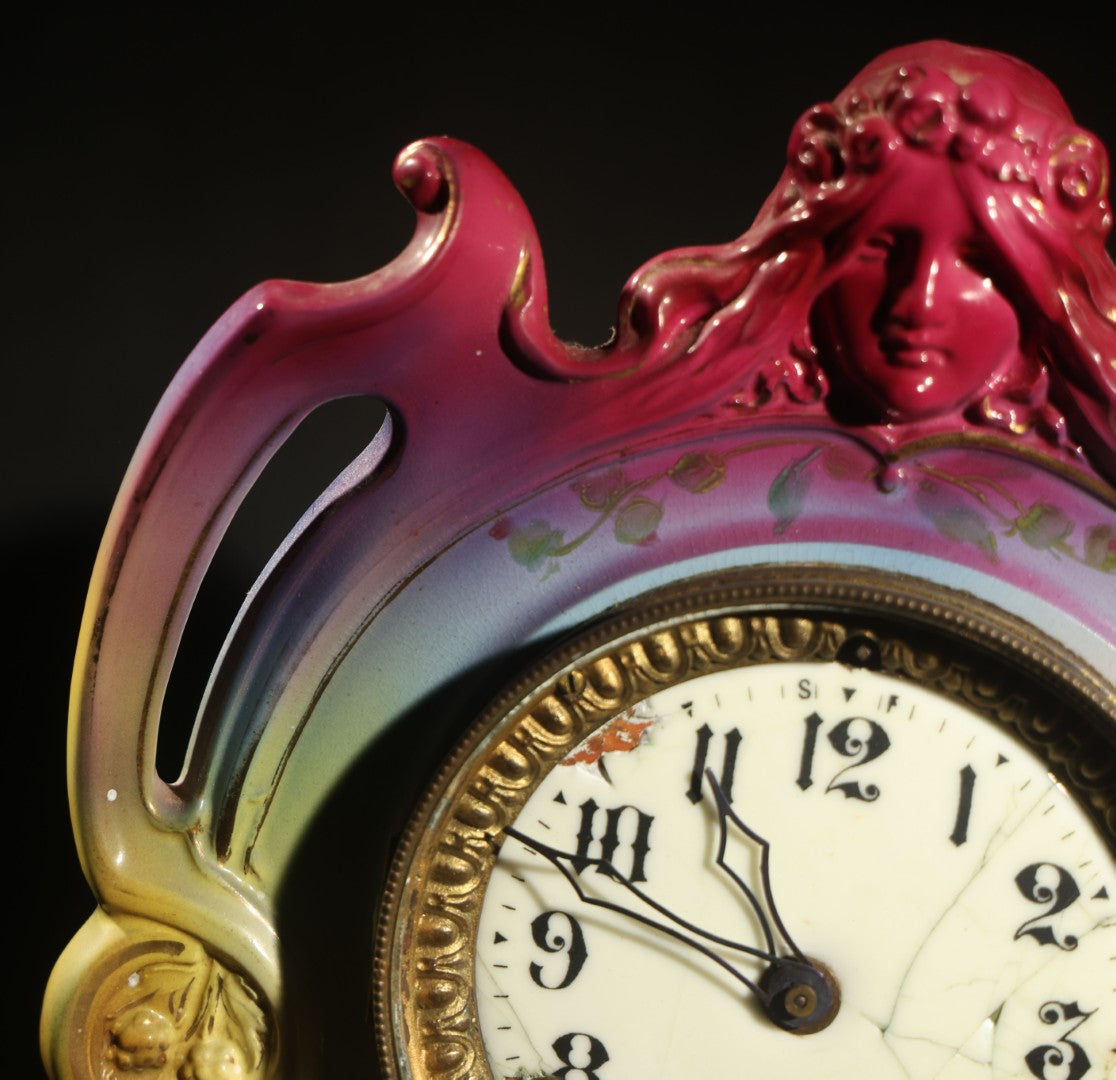 Antique Art Nouveau Porcelain Mantel Clock with Figural Head and Floral Decoration, Ansonia Clock Company, Bonn Germany, note severe damage to dial