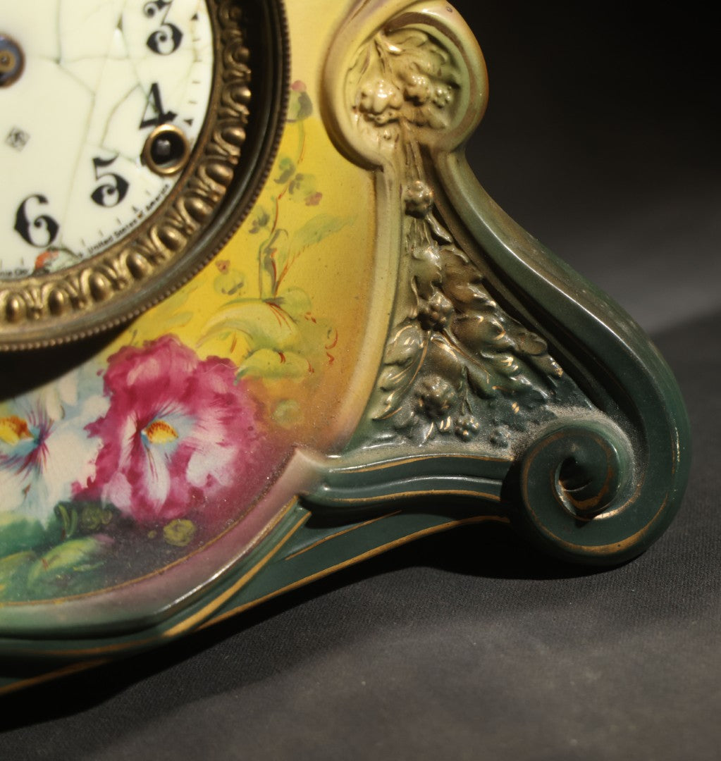 Antique Art Nouveau Porcelain Mantel Clock with Figural Head and Floral Decoration, Ansonia Clock Company, Bonn Germany, note severe damage to dial