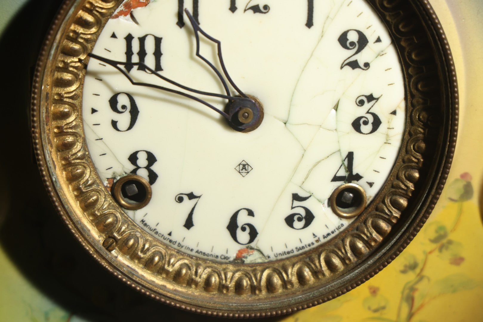 Antique Art Nouveau Porcelain Mantel Clock with Figural Head and Floral Decoration, Ansonia Clock Company, Bonn Germany, note severe damage to dial