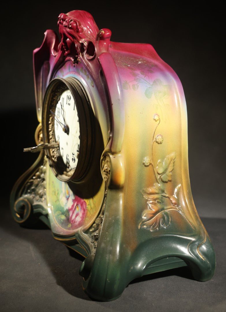 Antique Art Nouveau Porcelain Mantel Clock with Figural Head and Floral Decoration, Ansonia Clock Company, Bonn Germany, note severe damage to dial