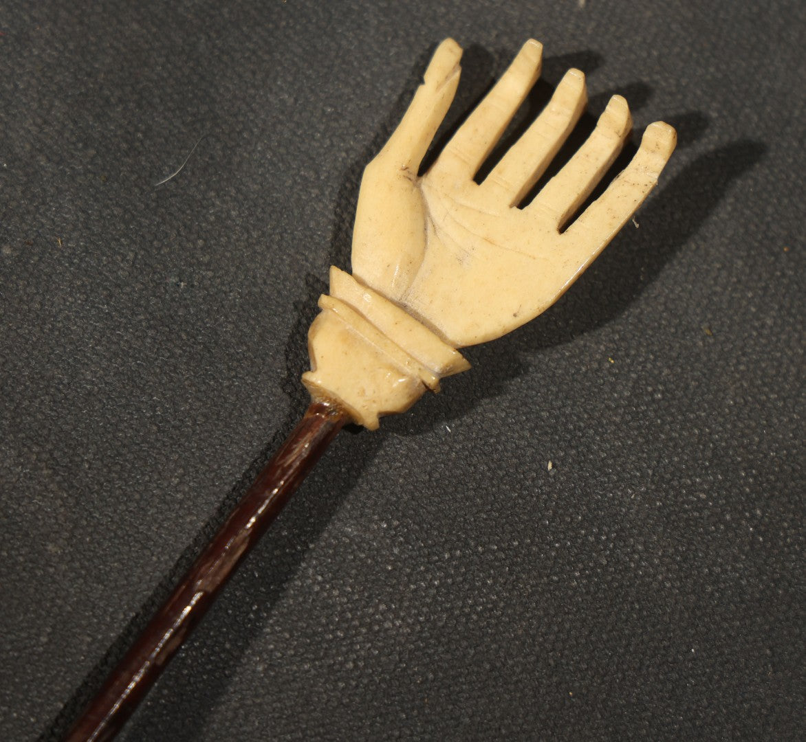 Antique Carved Bone Hand Form Back Scratcher, note chip