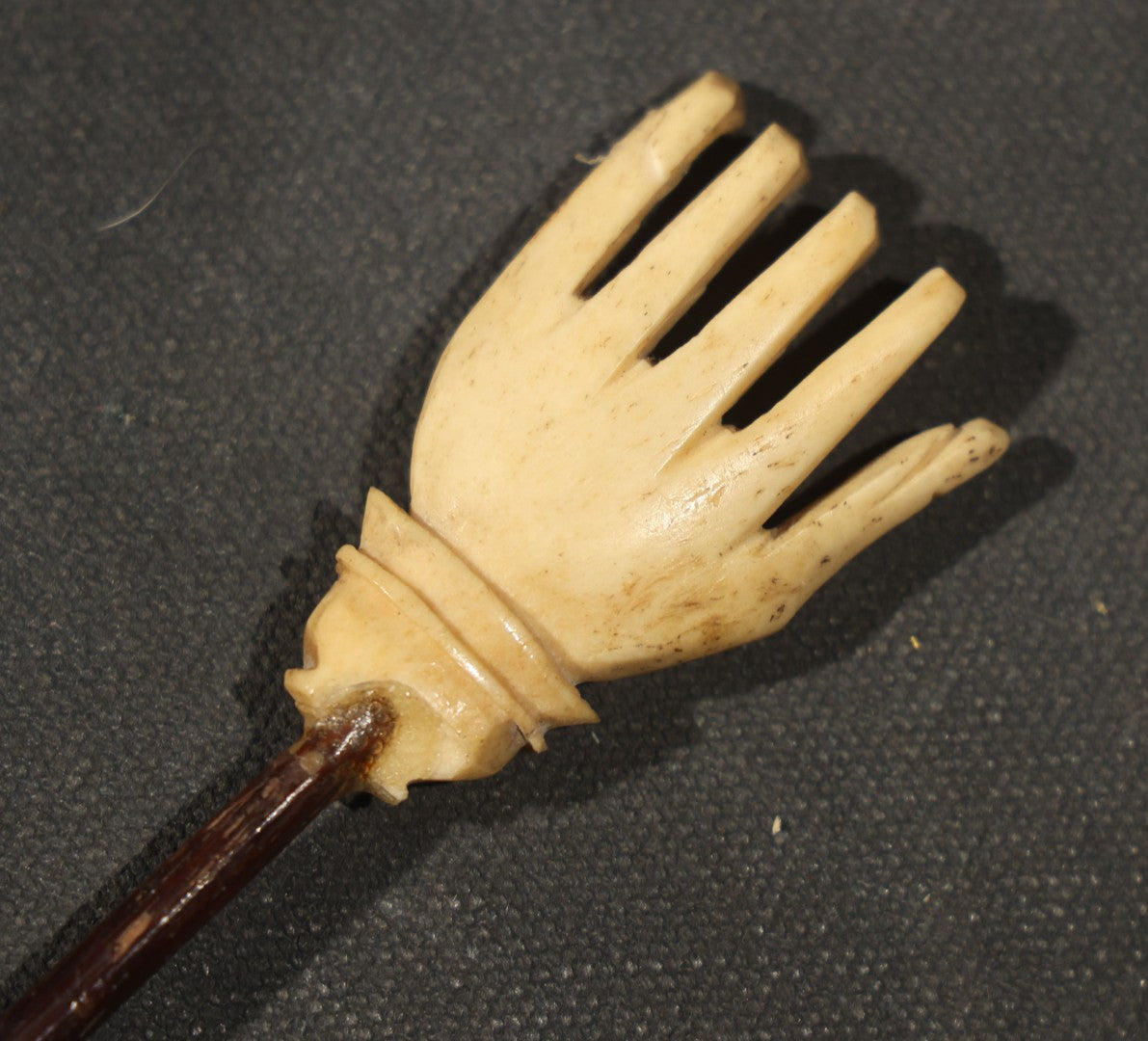 Antique Carved Bone Hand Form Back Scratcher, note chip