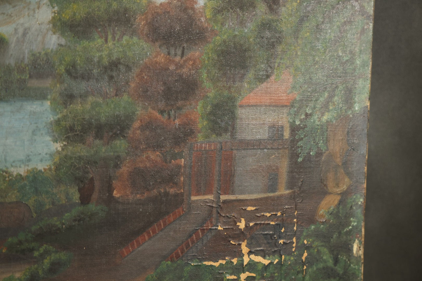 Antique Oil Painting on Canvas Depicting River Landscape with Building and Mountain Vista, poor condition