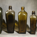 Lot 018 - Grouping of Five Antique Case Bottles, Olive Green and Amber Glass, Tapered Square Form, Possible Gin Bottles, 19th Century & 20th century