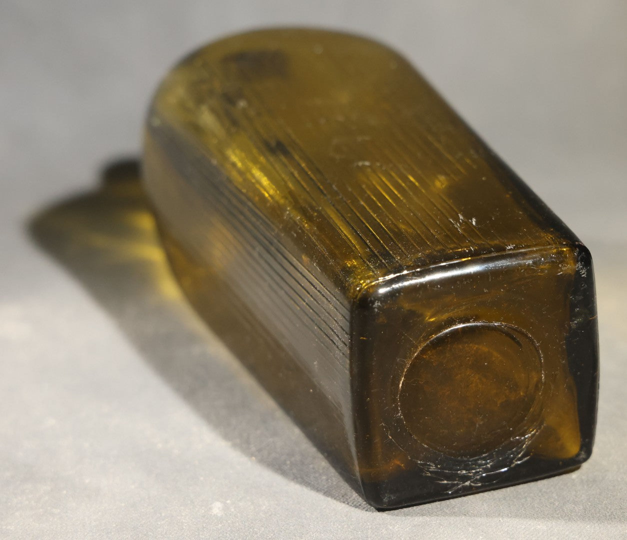 Grouping of Five Antique Case Bottles, Olive Green and Amber Glass, Tapered Square Form, Possible Gin Bottles, 19th Century & 20th century