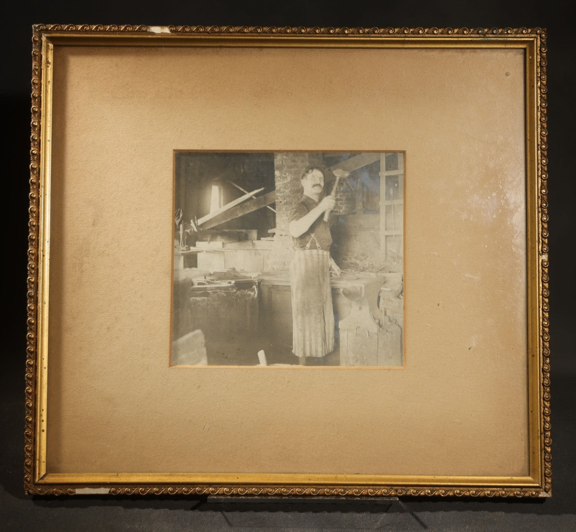 Antique Occupational Photograph of Blacksmith with Hammer in Workshop Setting, Framed