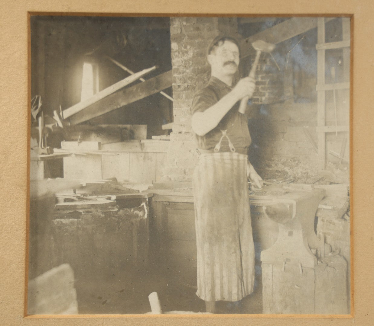 Antique Occupational Photograph of Blacksmith with Hammer in Workshop Setting, Framed