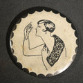 Lot 045 - Vintage Metamorphic Flipper Pocket Mirror with Risqué Optical Illusion of Woman in Patterned Dress, 2-1/8" W