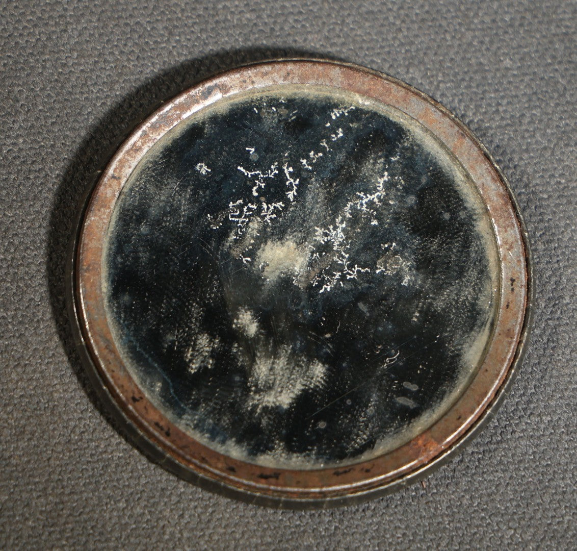 Vintage Metamorphic Flipper Pocket Mirror with Risqué Optical Illusion of Woman in Patterned Dress