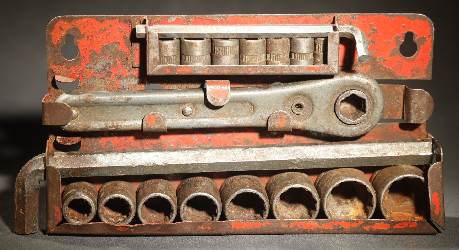 Vintage Ratcheting Socket Wrench Set with 15 Sockets in Metal Case with Orange Paint