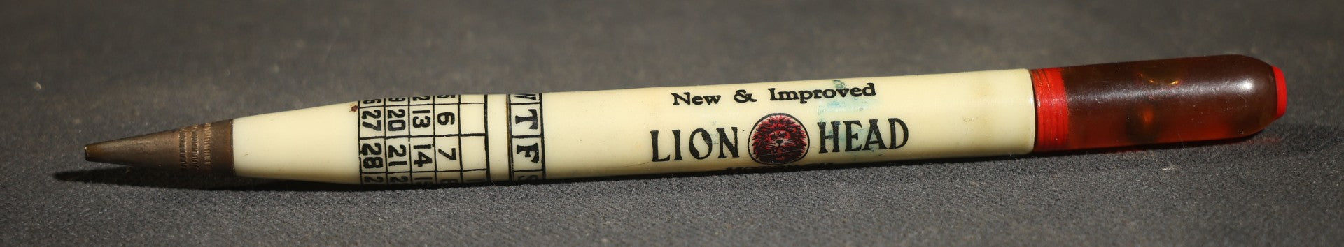 Pair of Vintage Advertising Items, Rheingold Beer Foam Scraper and Lion Head Motor Oil Pencil with real oil sample