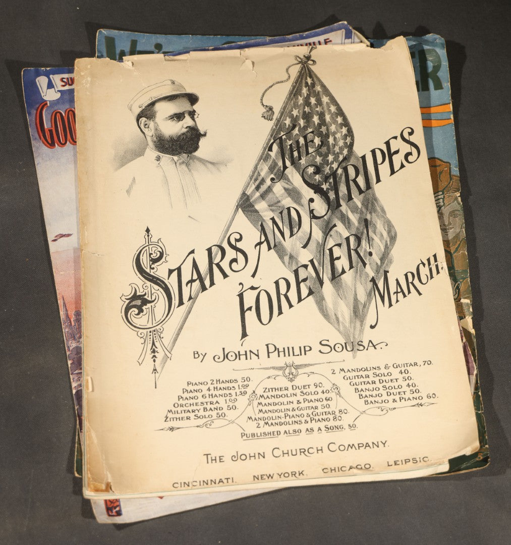 Grouping of four Antique Sheet Music including "We're Going Over," "Good-Bye Broadway, Hello France," "Strolling 'Round the Camp with Mary / Atta Boy," and "The Stars and Stripes Forever!" by John Philip Sousa