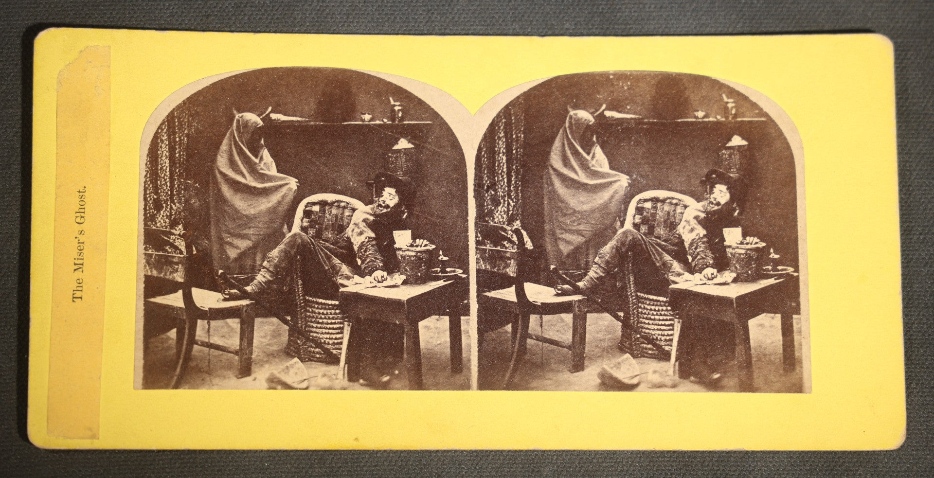 Antique Stereoview Card "The Miser's Ghost" Ghost Scene with Draped Figure and Seated Man at Table