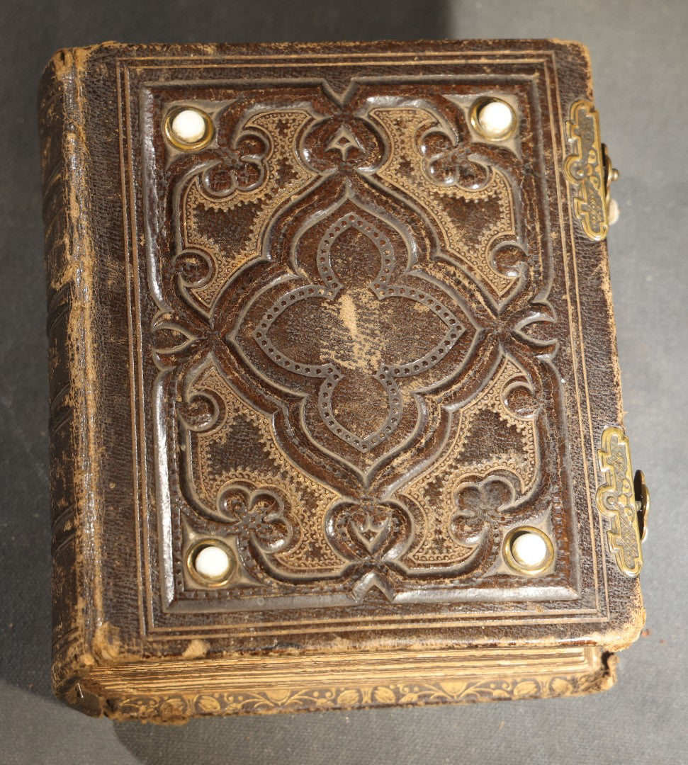 Antique Portrait Photo Album Containing 32 Tintype Photographs and 11 Carte de Visite C.D.V. Photographs, Leather Binding with Gauffered Edges, manufactured by Altemus & Co., Philadelphia, circa 1860s