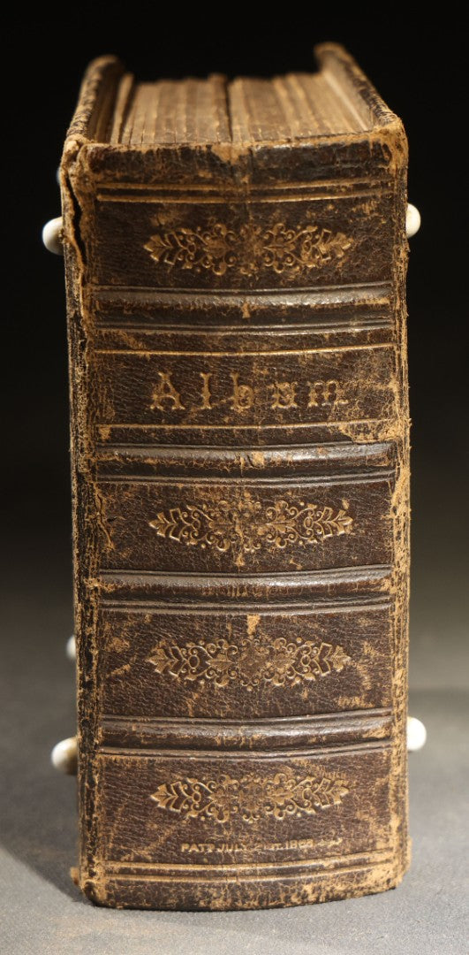 Antique Portrait Photo Album Containing 32 Tintype Photographs and 11 Carte de Visite C.D.V. Photographs, Leather Binding with Gauffered Edges, manufactured by Altemus & Co., Philadelphia, circa 1860s