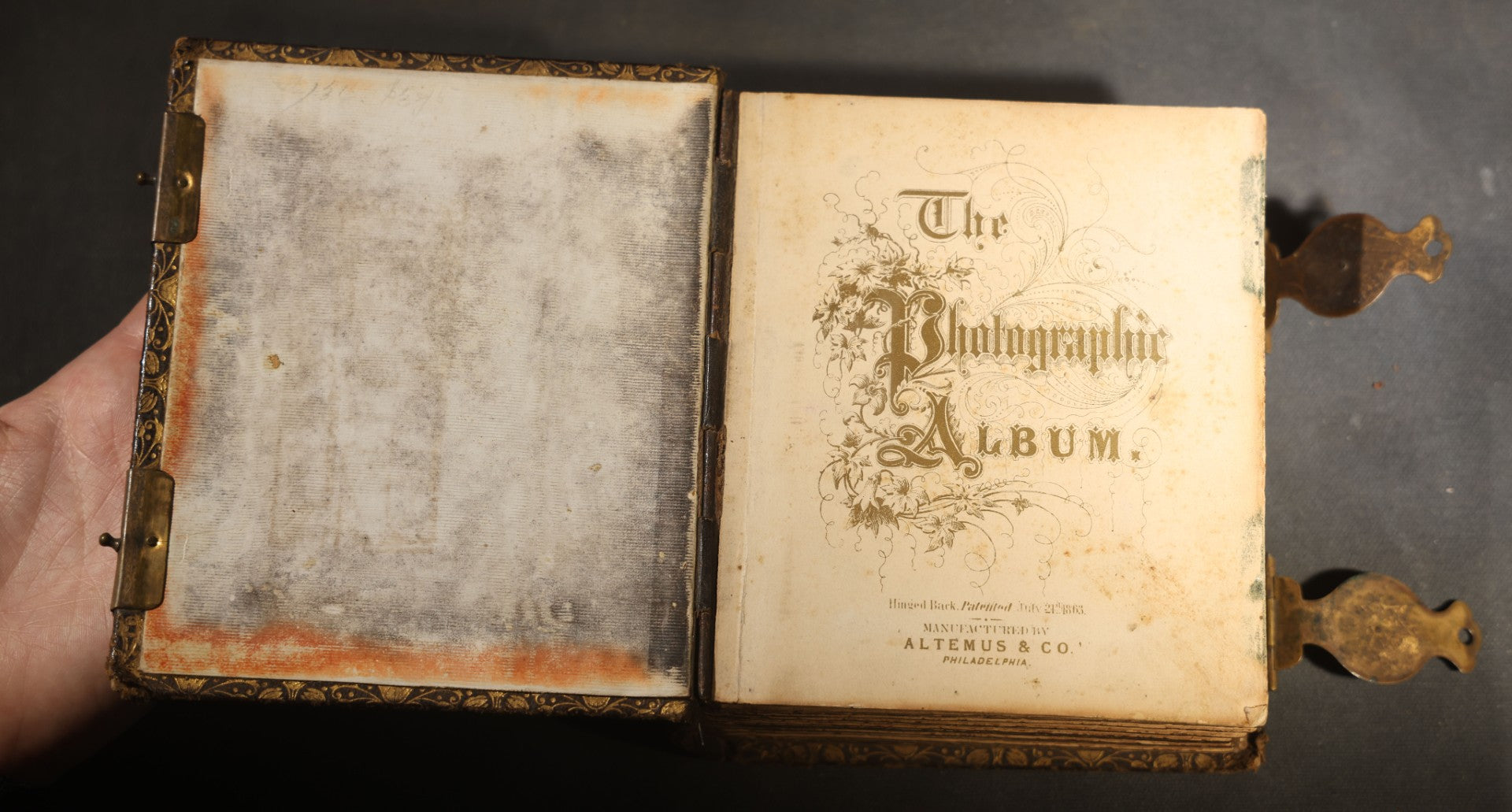 Antique Portrait Photo Album Containing 32 Tintype Photographs and 11 Carte de Visite C.D.V. Photographs, Leather Binding with Gauffered Edges, manufactured by Altemus & Co., Philadelphia, circa 1860s