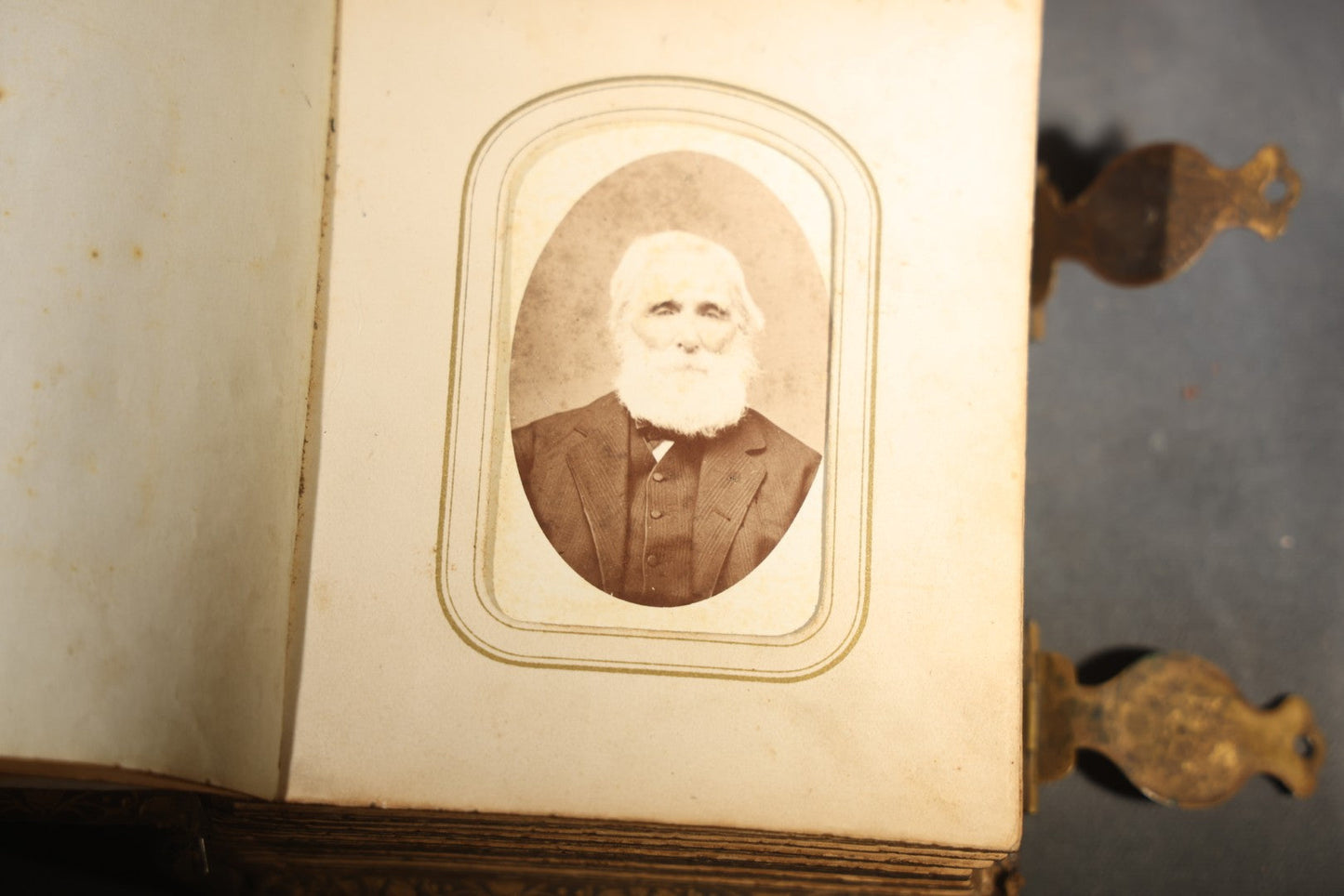 Antique Portrait Photo Album Containing 32 Tintype Photographs and 11 Carte de Visite C.D.V. Photographs, Leather Binding with Gauffered Edges, manufactured by Altemus & Co., Philadelphia, circa 1860s