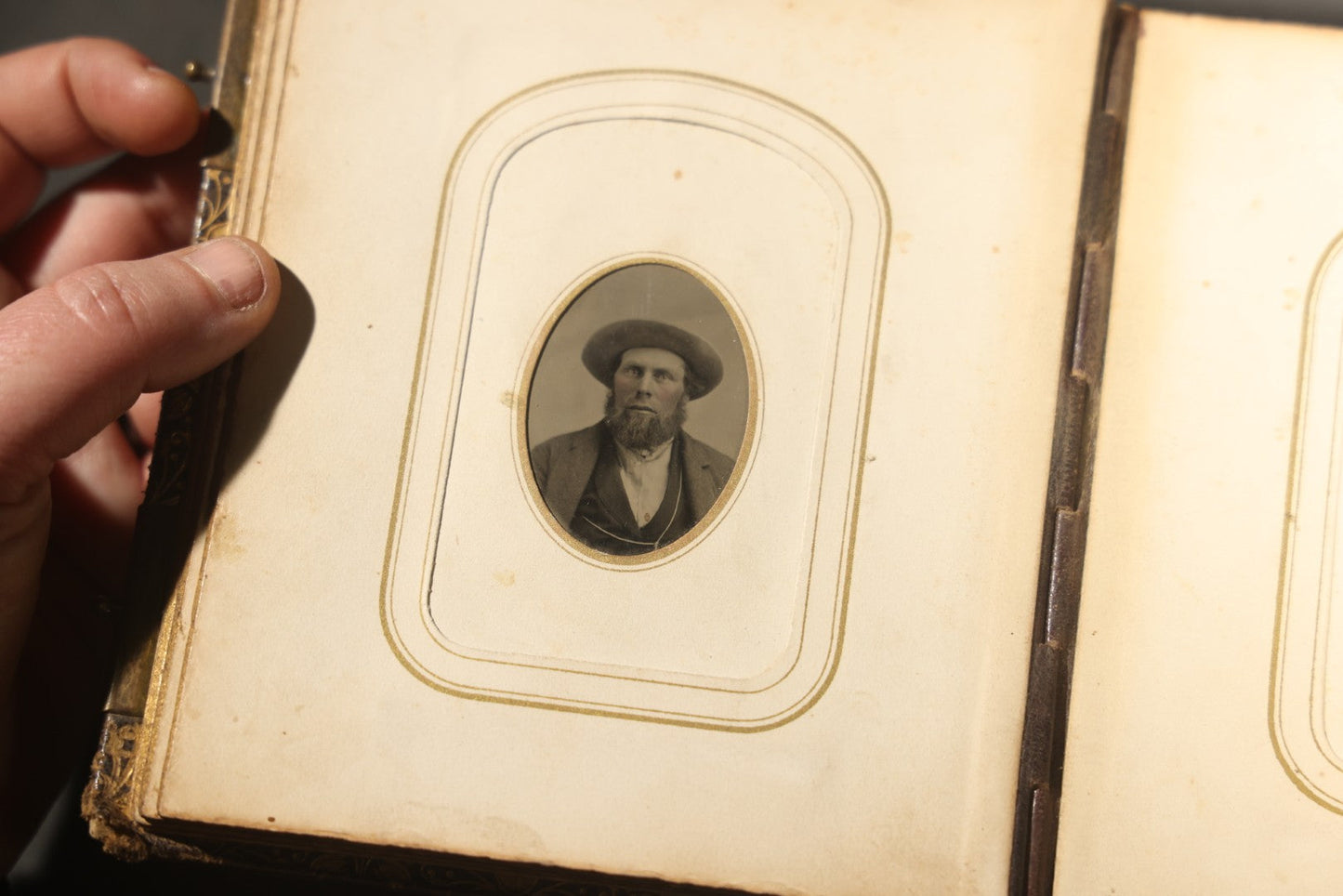 Antique Portrait Photo Album Containing 32 Tintype Photographs and 11 Carte de Visite C.D.V. Photographs, Leather Binding with Gauffered Edges, manufactured by Altemus & Co., Philadelphia, circa 1860s