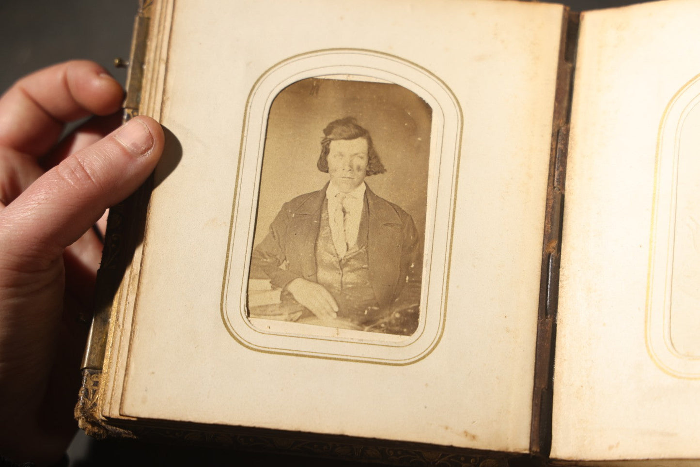 Antique Portrait Photo Album Containing 32 Tintype Photographs and 11 Carte de Visite C.D.V. Photographs, Leather Binding with Gauffered Edges, manufactured by Altemus & Co., Philadelphia, circa 1860s
