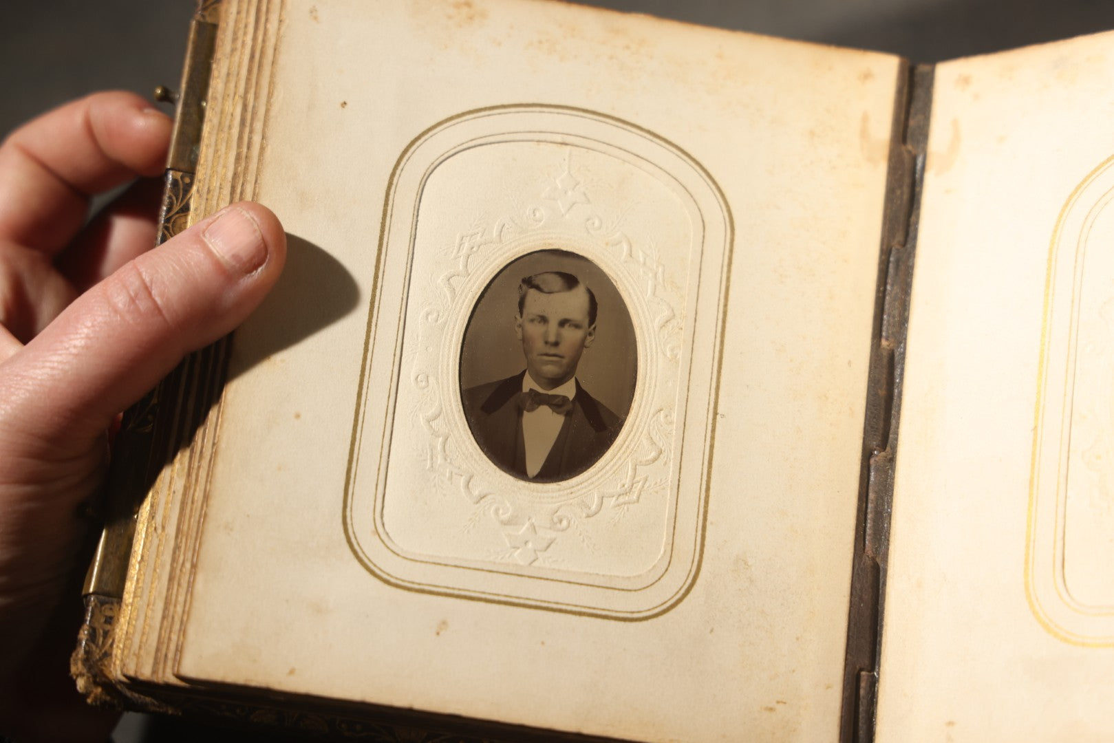 Antique Portrait Photo Album Containing 32 Tintype Photographs and 11 Carte de Visite C.D.V. Photographs, Leather Binding with Gauffered Edges, manufactured by Altemus & Co., Philadelphia, circa 1860s