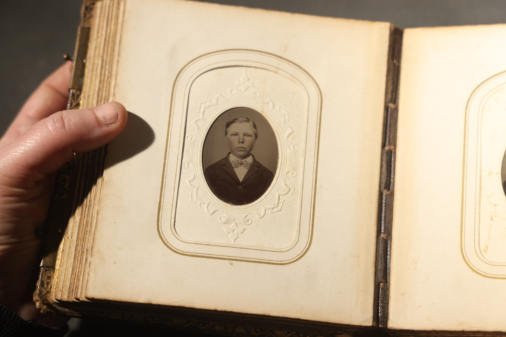 Antique Portrait Photo Album Containing 32 Tintype Photographs and 11 Carte de Visite C.D.V. Photographs, Leather Binding with Gauffered Edges, manufactured by Altemus & Co., Philadelphia, circa 1860s