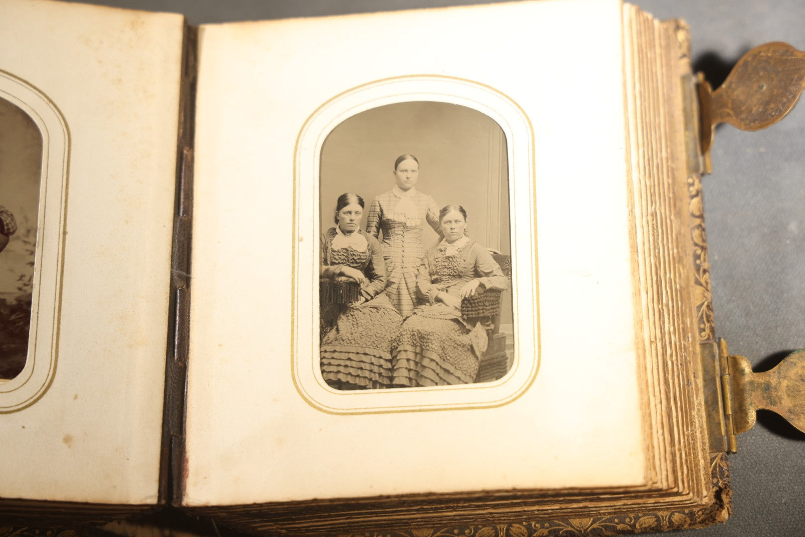 Antique Portrait Photo Album Containing 32 Tintype Photographs and 11 Carte de Visite C.D.V. Photographs, Leather Binding with Gauffered Edges, manufactured by Altemus & Co., Philadelphia, circa 1860s