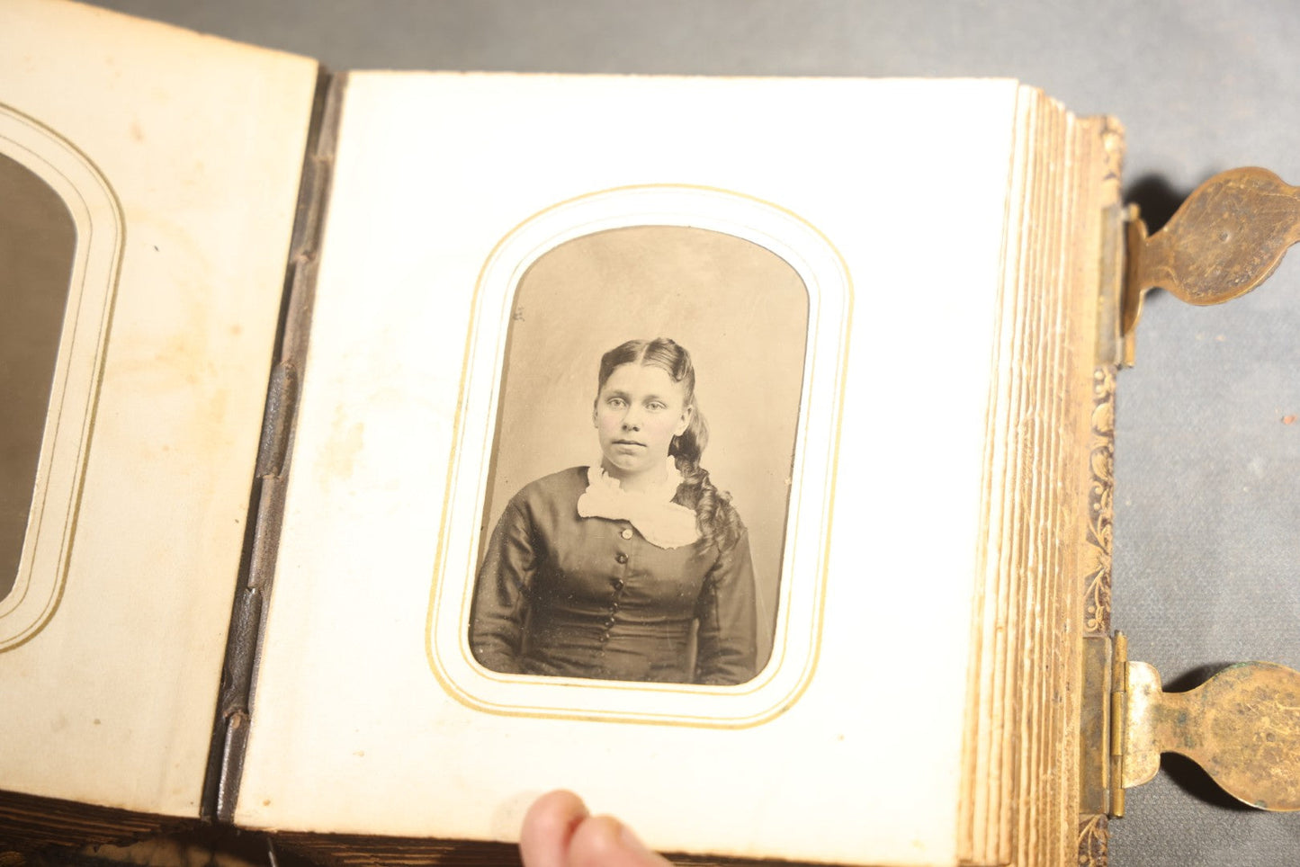 Antique Portrait Photo Album Containing 32 Tintype Photographs and 11 Carte de Visite C.D.V. Photographs, Leather Binding with Gauffered Edges, manufactured by Altemus & Co., Philadelphia, circa 1860s