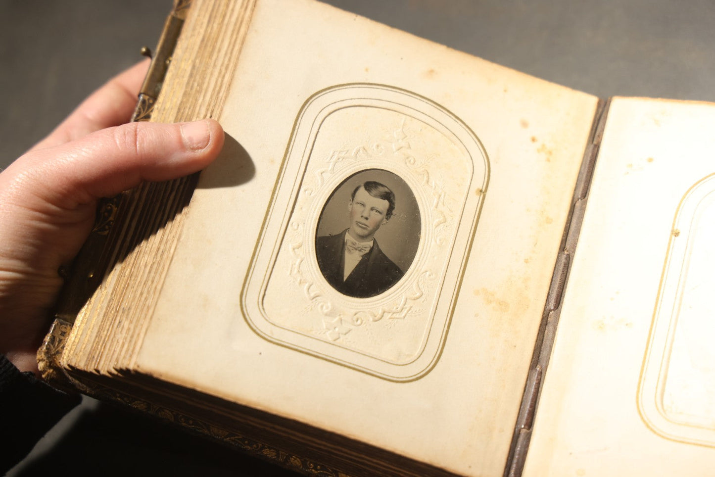 Antique Portrait Photo Album Containing 32 Tintype Photographs and 11 Carte de Visite C.D.V. Photographs, Leather Binding with Gauffered Edges, manufactured by Altemus & Co., Philadelphia, circa 1860s