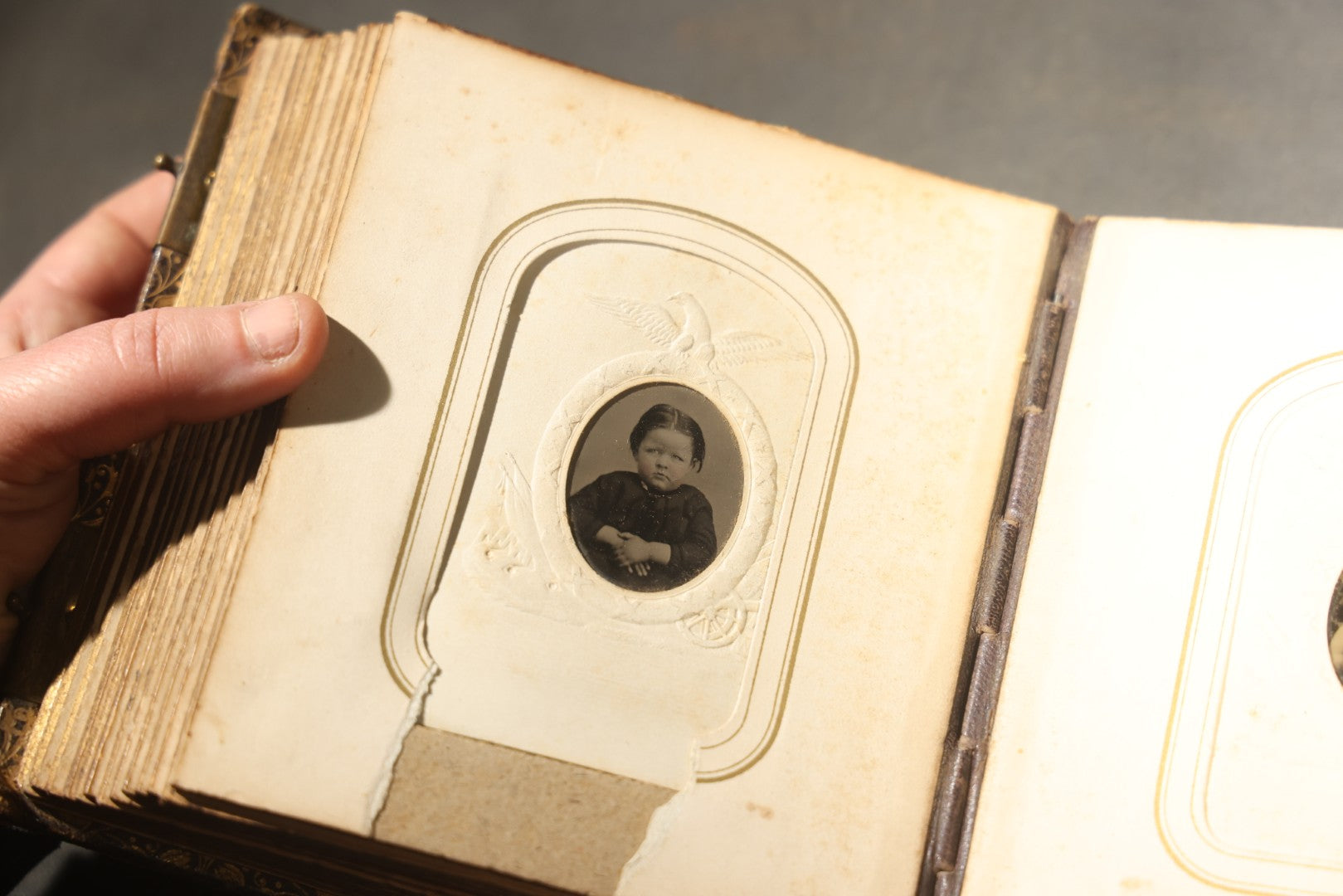 Antique Portrait Photo Album Containing 32 Tintype Photographs and 11 Carte de Visite C.D.V. Photographs, Leather Binding with Gauffered Edges, manufactured by Altemus & Co., Philadelphia, circa 1860s