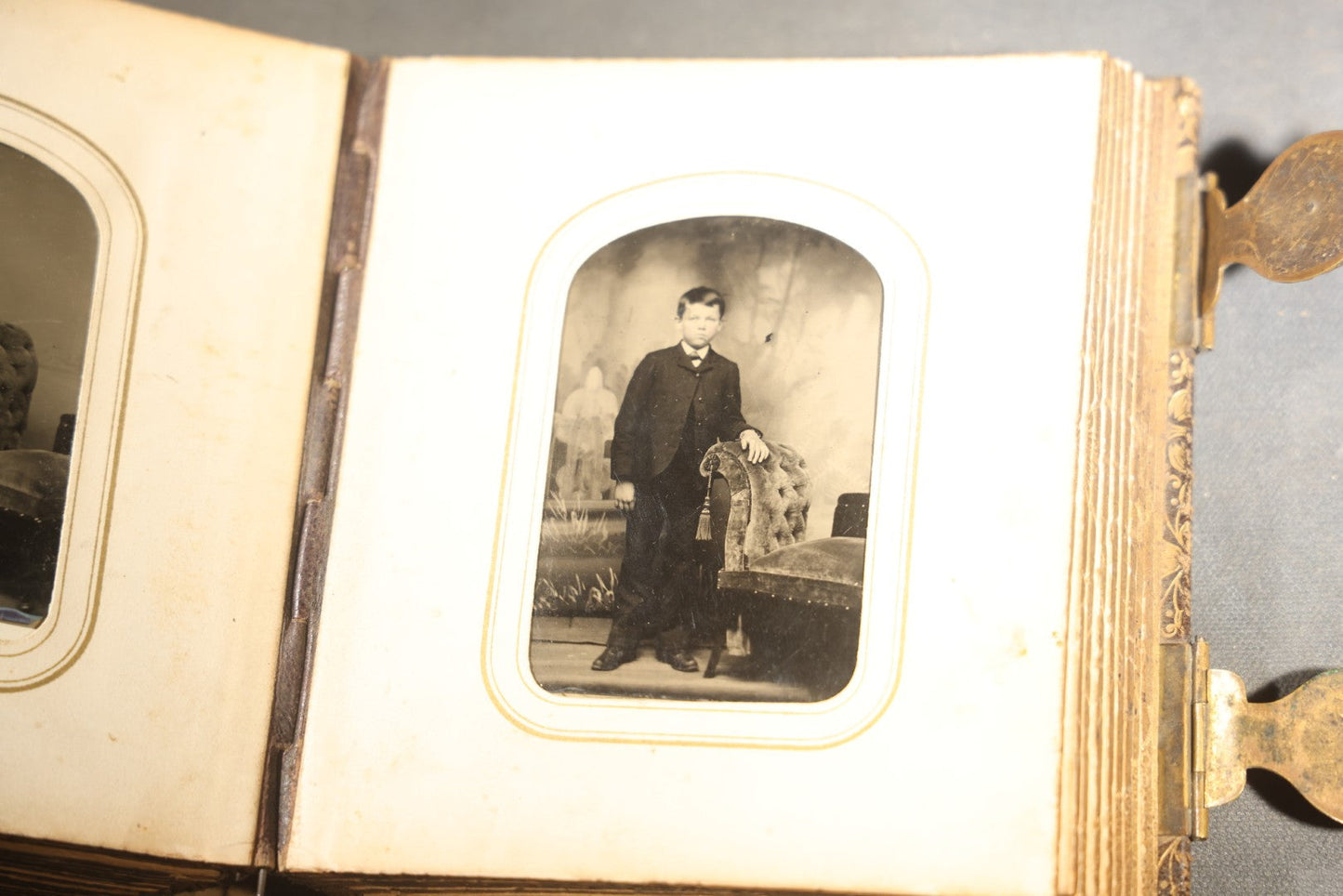 Antique Portrait Photo Album Containing 32 Tintype Photographs and 11 Carte de Visite C.D.V. Photographs, Leather Binding with Gauffered Edges, manufactured by Altemus & Co., Philadelphia, circa 1860s