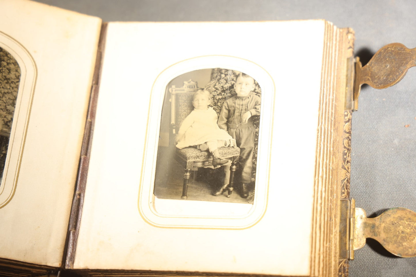 Antique Portrait Photo Album Containing 32 Tintype Photographs and 11 Carte de Visite C.D.V. Photographs, Leather Binding with Gauffered Edges, manufactured by Altemus & Co., Philadelphia, circa 1860s