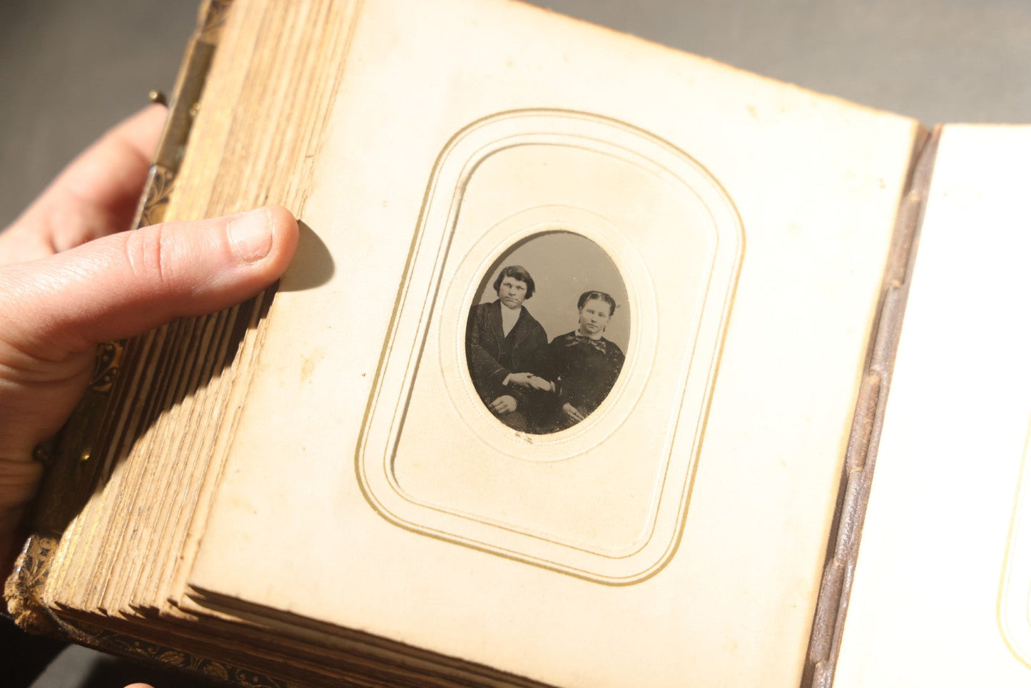 Antique Portrait Photo Album Containing 32 Tintype Photographs and 11 Carte de Visite C.D.V. Photographs, Leather Binding with Gauffered Edges, manufactured by Altemus & Co., Philadelphia, circa 1860s