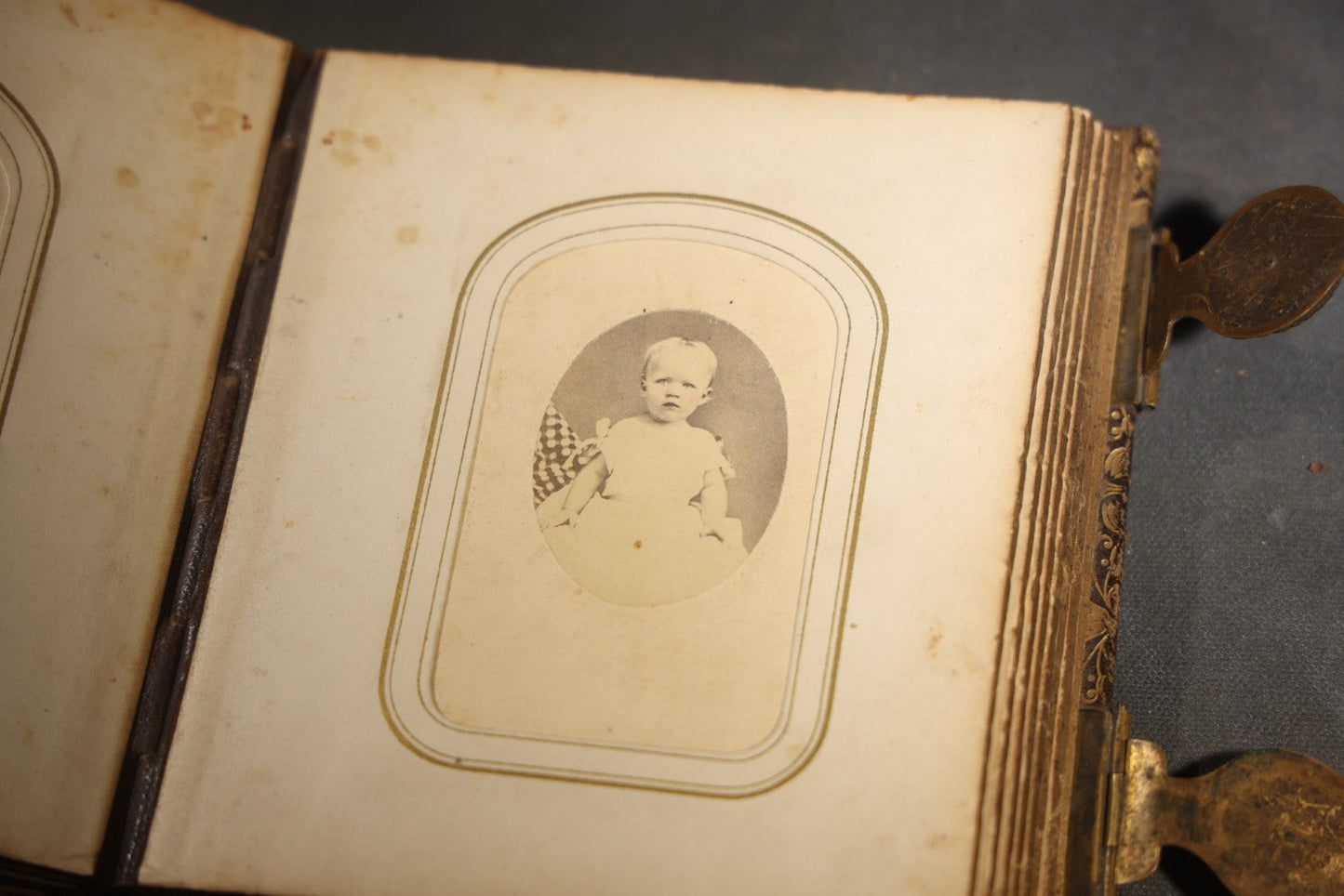 Antique Portrait Photo Album Containing 32 Tintype Photographs and 11 Carte de Visite C.D.V. Photographs, Leather Binding with Gauffered Edges, manufactured by Altemus & Co., Philadelphia, circa 1860s