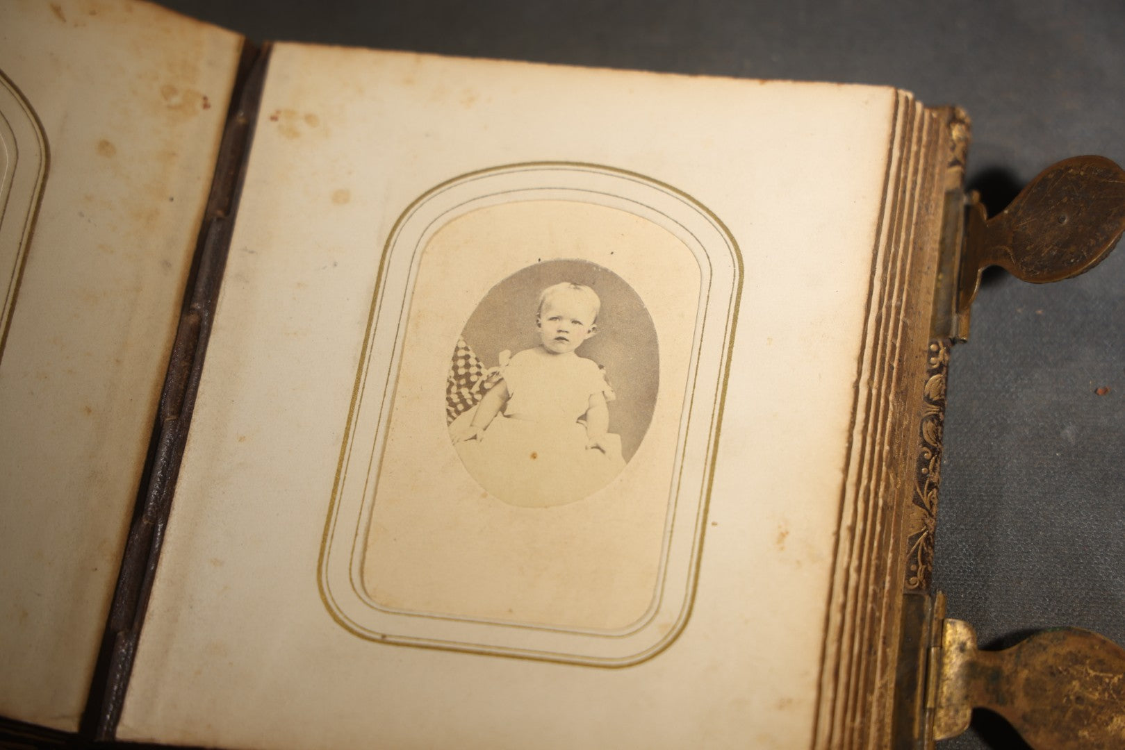 Antique Portrait Photo Album Containing 32 Tintype Photographs and 11 Carte de Visite C.D.V. Photographs, Leather Binding with Gauffered Edges, manufactured by Altemus & Co., Philadelphia, circa 1860s