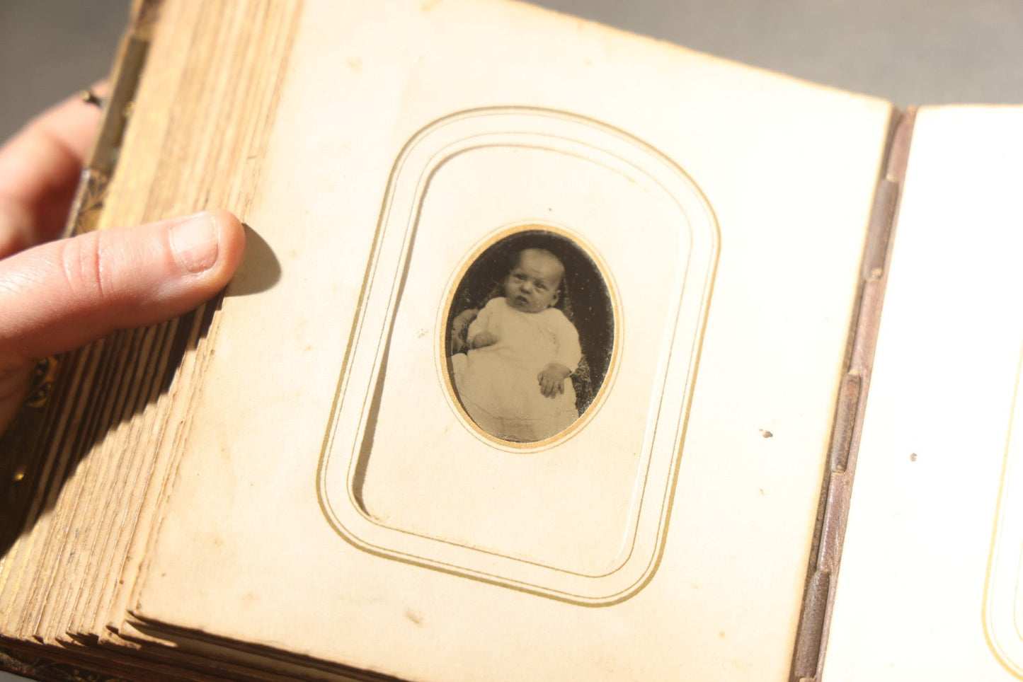 Antique Portrait Photo Album Containing 32 Tintype Photographs and 11 Carte de Visite C.D.V. Photographs, Leather Binding with Gauffered Edges, manufactured by Altemus & Co., Philadelphia, circa 1860s