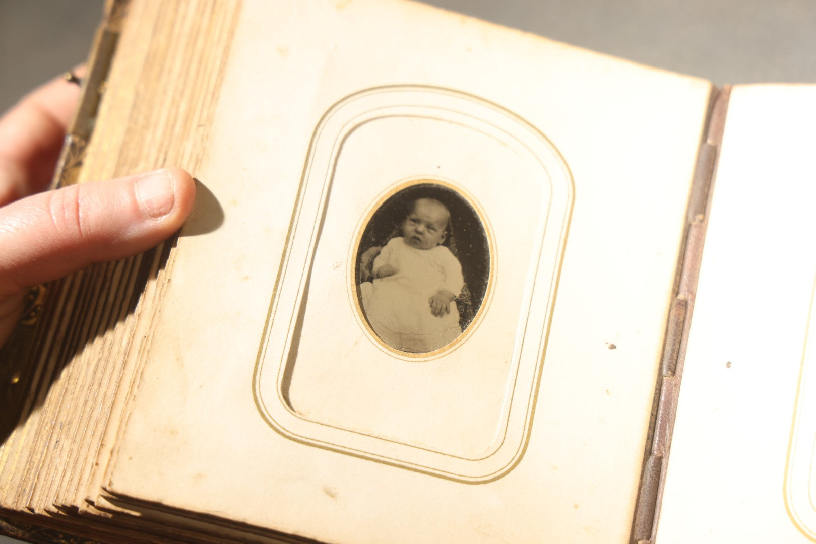 Antique Portrait Photo Album Containing 32 Tintype Photographs and 11 Carte de Visite C.D.V. Photographs, Leather Binding with Gauffered Edges, manufactured by Altemus & Co., Philadelphia, circa 1860s