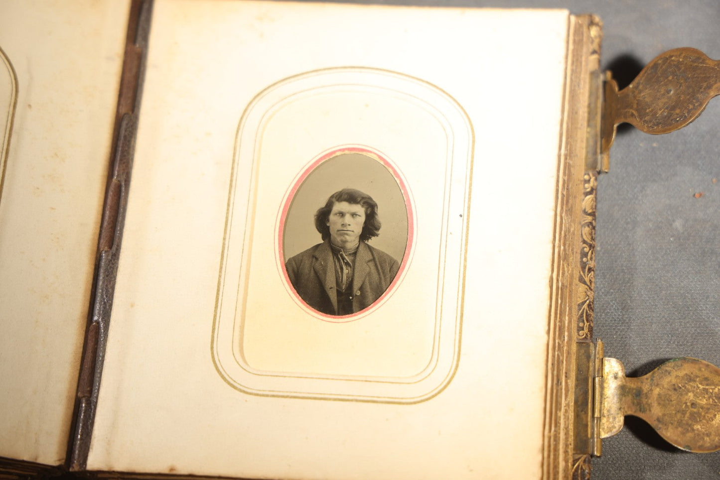 Antique Portrait Photo Album Containing 32 Tintype Photographs and 11 Carte de Visite C.D.V. Photographs, Leather Binding with Gauffered Edges, manufactured by Altemus & Co., Philadelphia, circa 1860s